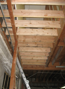Floor joists to cover old stairwell