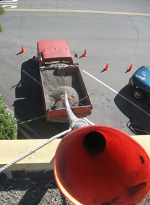 Funnel and pipe for removal of gravel from the roof.