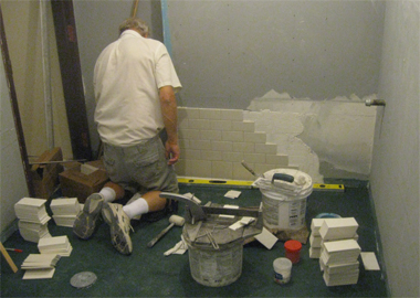 Work commenced on installing tiles in the upstairs restrooms.
