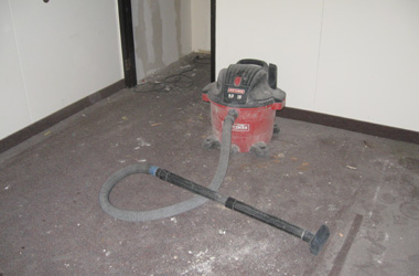 A shop vacuum used to remove three years of construction dust on the carpet.