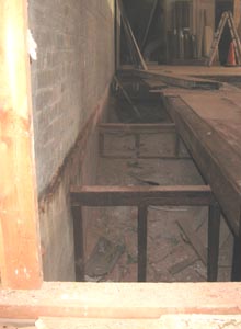 Demolition revealed a ramp that once led to the basement.