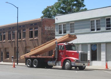 A special order load of lumber arrives from Berry's Sawmill, Inc.